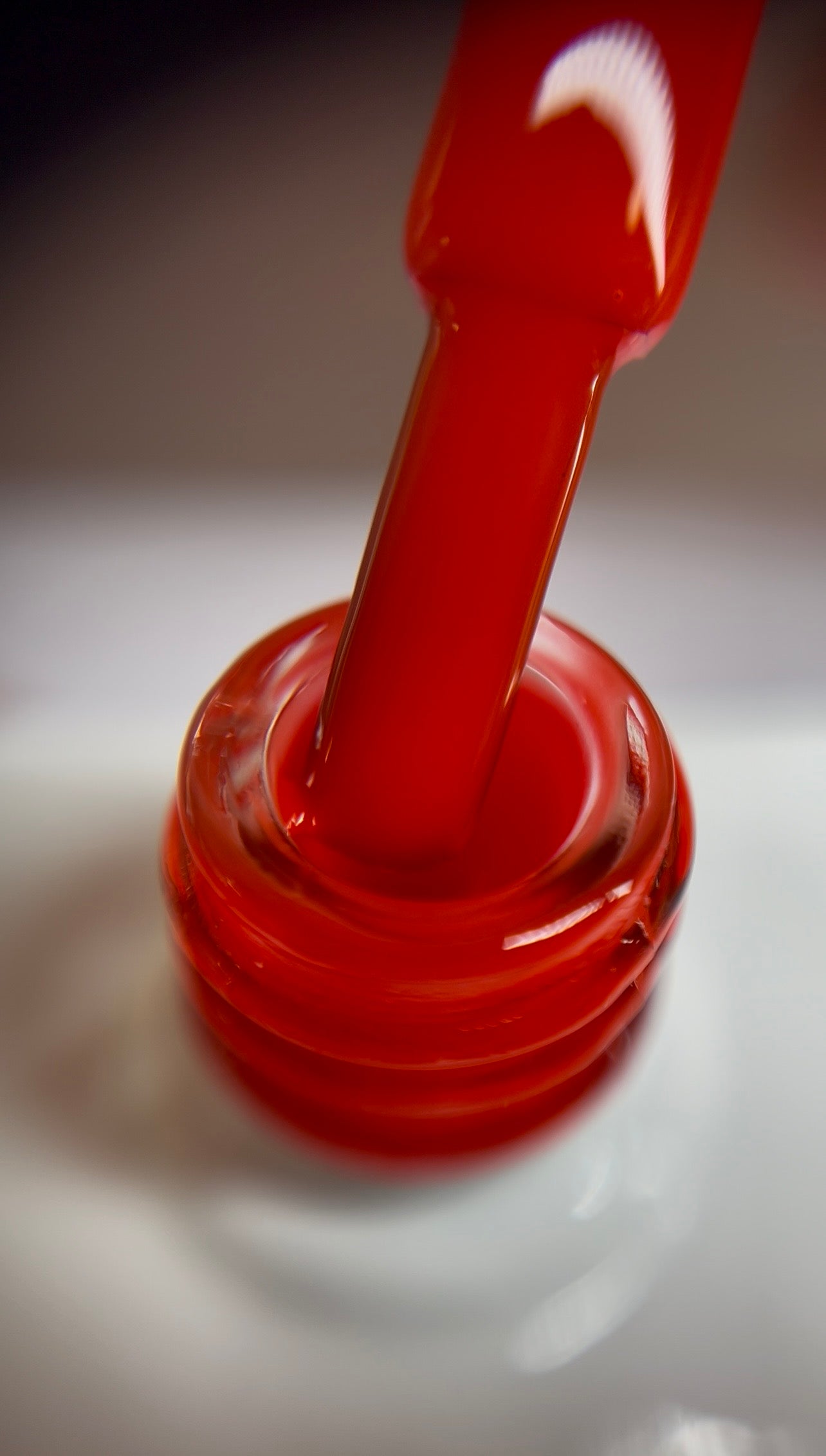 Bright orange-red gel polish with high intensity and glossy finish. Bold, vibrant coverage that stands out instantly. TPO-free and HEMA-free.