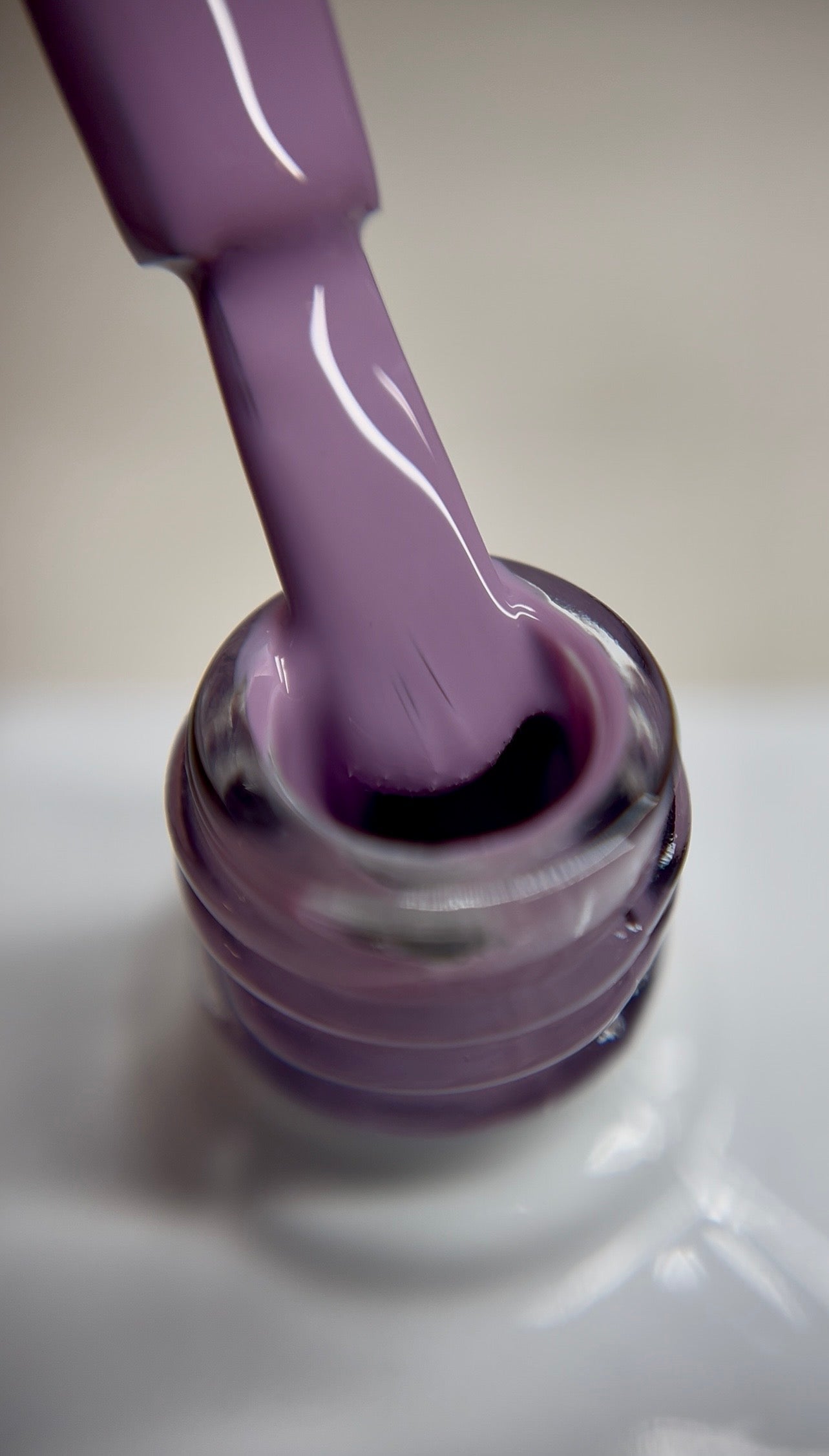 Soft lilac nude gel polish with a cool undertone and creamy finish. A modern nude shade for professional salon use, ideal for minimal nail designs, French bases, and chrome application. Smooth coverage with thin layers. TPO-free and HEMA-free.
