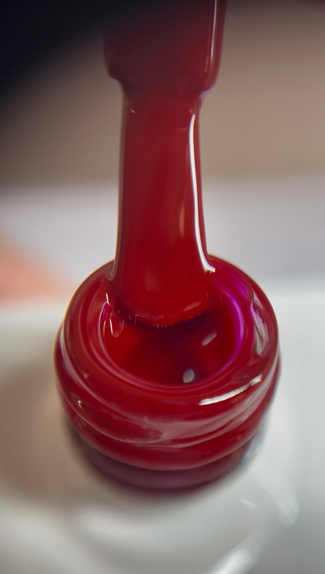 Deep, rich red with a pink-toned undertone. Smooth, glossy finish. TPO & HEMA free.