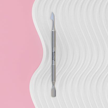 Manicure Pusher BEAUTY & CARE 30 TYPE 1 (Rounded Narrow Pusher And Cleaner)with 'Staleks' branding on a wavy white and pink background