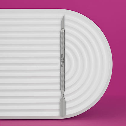 Manicure Pusher EXPERT 90 TYPE 2 (Beveled And Rounded Wide Pusher) on a white platform with a purple background