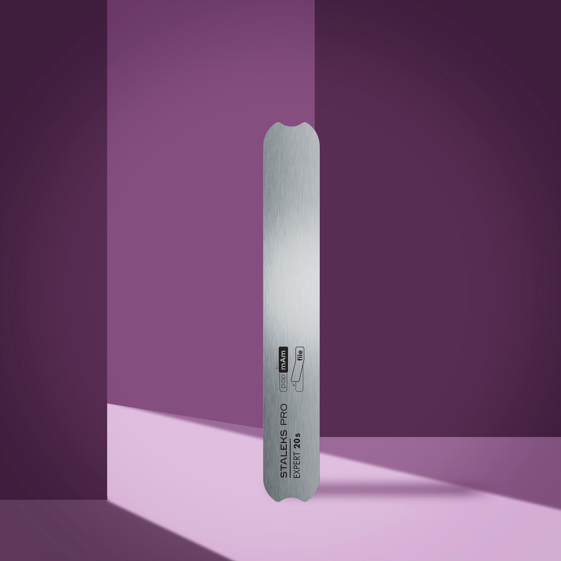 Straight Metal Base For Nail File EXPERT 20s (130 Mm) Metal ruler on a purple background
