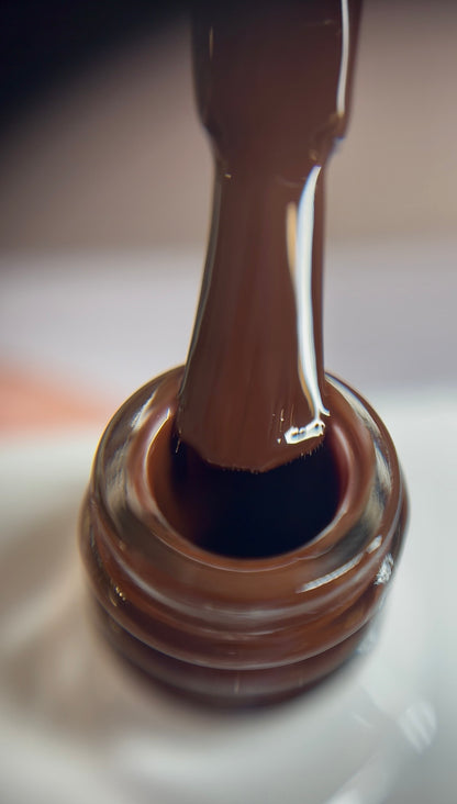 Rich chocolate brown gel polish with a warm undertone and glossy finish. Smooth, even coverage for elegant and timeless nail looks. TPO-free and HEMA-free.